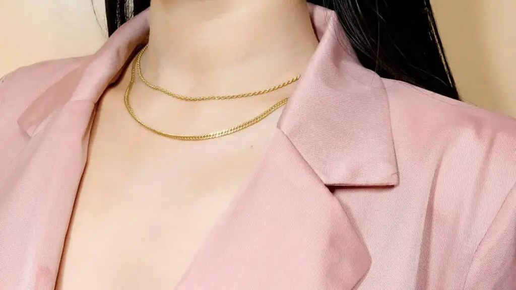 Woman wearing waterproof gold jewelry